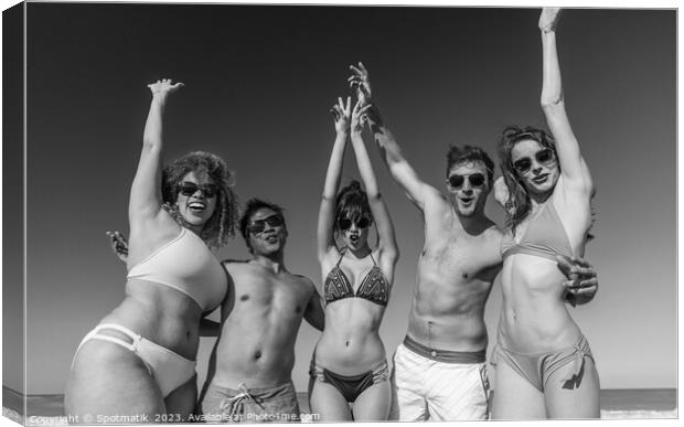 Beach party fun friends in swimwear enjoying vacation Canvas Print by Spotmatik 