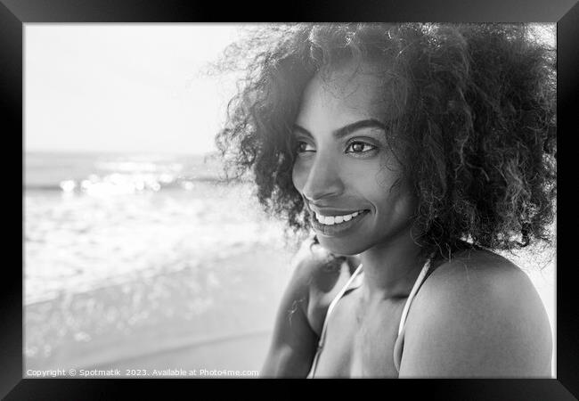 Smiling Afro American female enjoying Summer by Ocean Framed Print by Spotmatik 