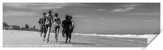 Panoramic view of friends jogging together on beach Print by Spotmatik 