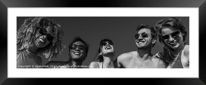 Panoramic view of multi ethnic friends in swimwear Framed Mounted Print by Spotmatik 