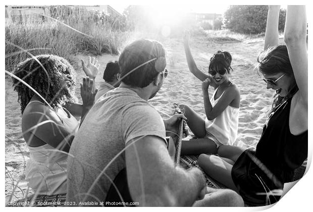 Outdoor fun on beach friends enjoying guitar music Print by Spotmatik 