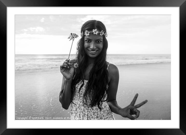 Freedom outdoors for smiling Indian girl by ocean Framed Mounted Print by Spotmatik 
