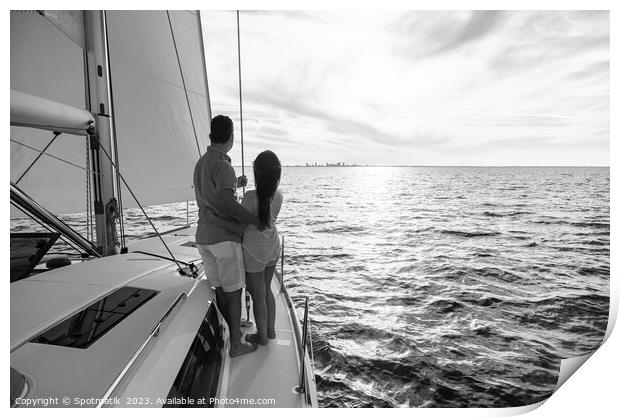 Hispanic couple travelling on luxury yacht at sunset Print by Spotmatik 