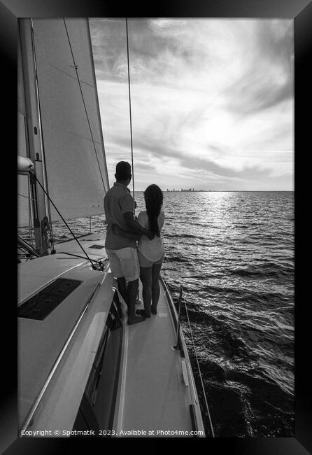 Sunrise view for Latin American couple on yacht Framed Print by Spotmatik 