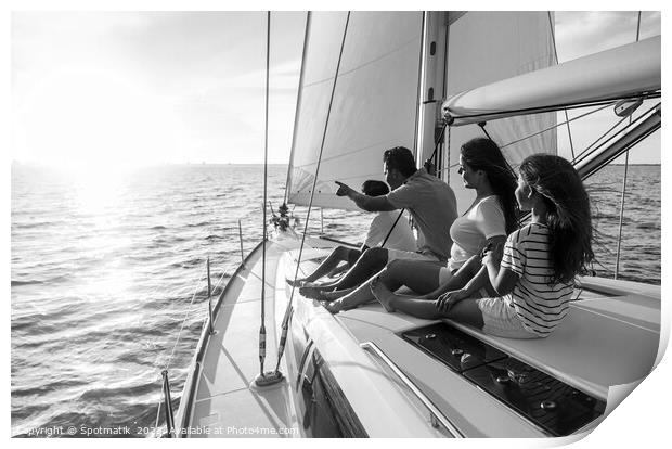 Relaxed family on luxury yacht sailing towards sunset Print by Spotmatik 