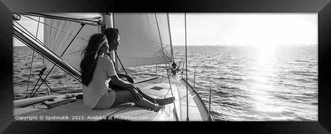 Panorama of young Hispanic couple at leisure on luxury yacht Framed Print by Spotmatik 