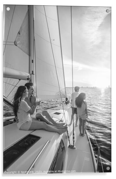 Hispanic family enjoying vacation on yacht at sunset Acrylic by Spotmatik 