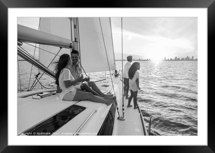 Fun family vacation on luxury yacht at sunrise Framed Mounted Print by Spotmatik 