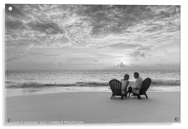 Mature couple enjoying ocean sunset on beach Bahamas Acrylic by Spotmatik 