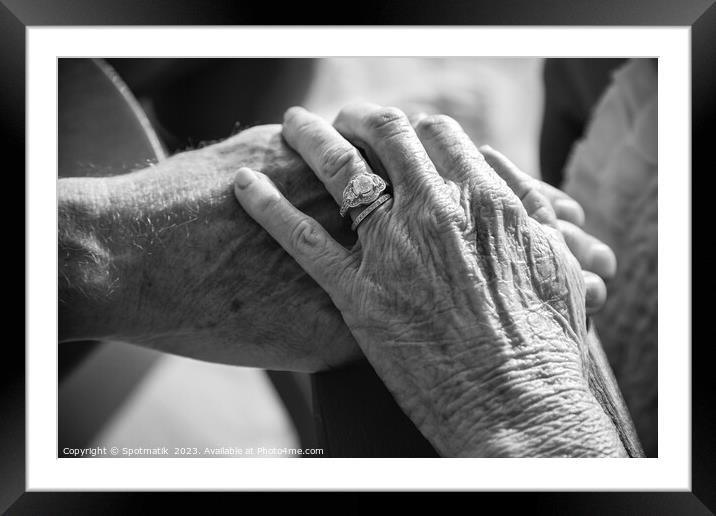 Linked hands of senior Caucasian couple on vacation Framed Mounted Print by Spotmatik 