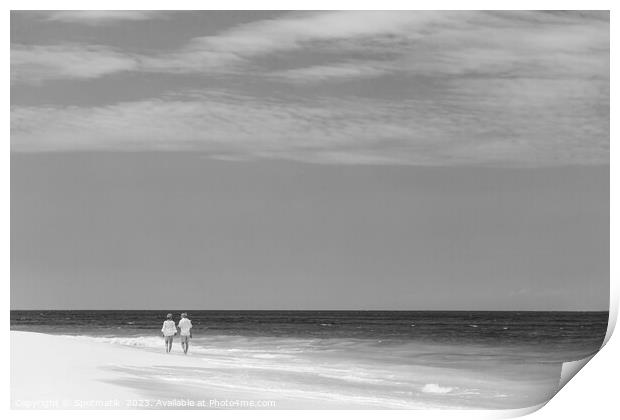 Mature couple walking along shoreline at beach resort Print by Spotmatik 
