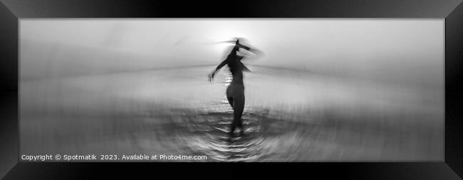 Panoramic ocean sunset with dancing girl motion blur Framed Print by Spotmatik 