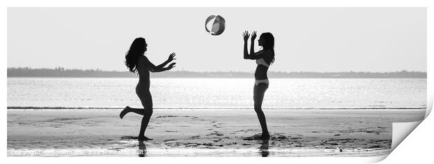 Panoramic silhouette friends with beach ball at sunset Print by Spotmatik 