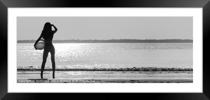 Panoramic Asian girl watching sunset over shimmering ocean Framed Mounted Print by Spotmatik 