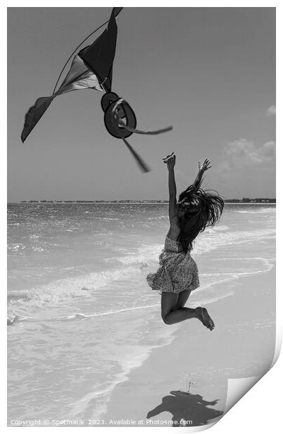 Happy Asian girl jumping by ocean flying kite Print by Spotmatik 