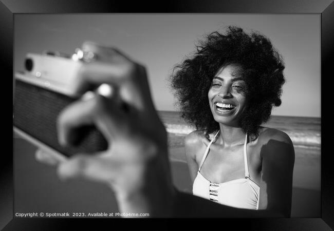 Laughing African American girl taking selfie on beach Framed Print by Spotmatik 
