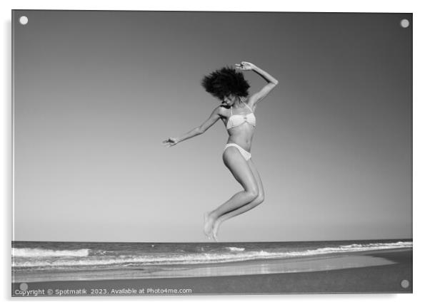 Afro American woman jumping for joy on beach Acrylic by Spotmatik 