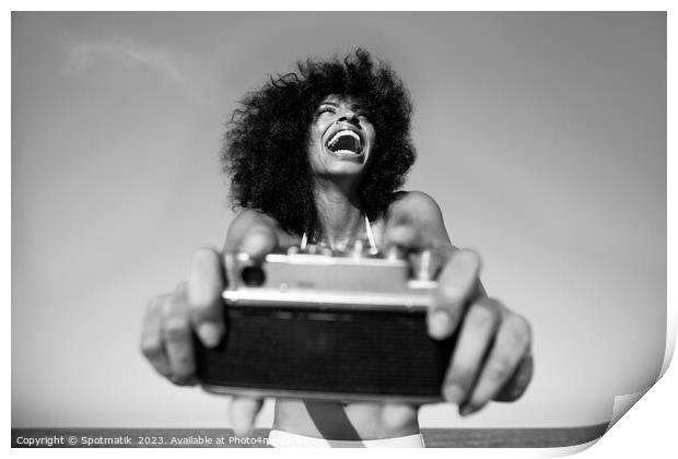 Laughing Afro American girl taking selfie on beach Print by Spotmatik 