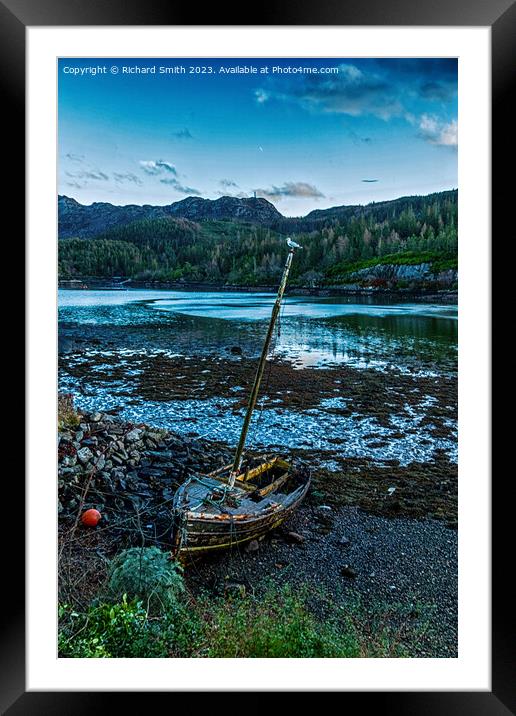 Abandoned wooden dinghy in Loch Carron at Plockton Framed Mounted Print by Richard Smith