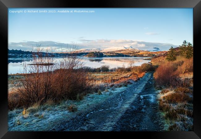 Frost and snow on track to shore Framed Print by Richard Smith
