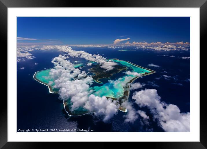 Aerial cloud covered Bora Bora in French Polynesia  Framed Mounted Print by Spotmatik 