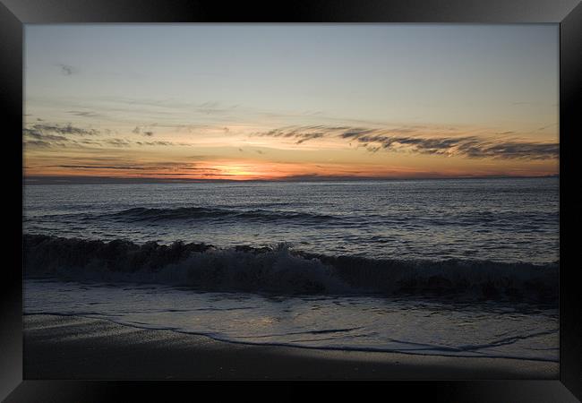 Levanto Beach sunset Framed Print by Ian Middleton