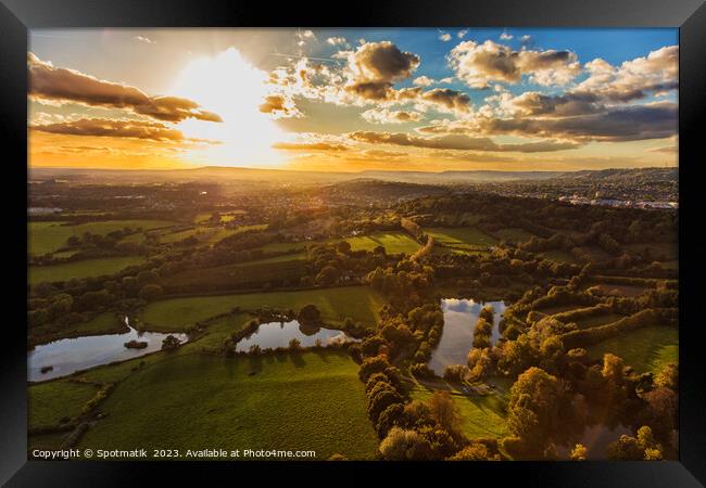 Aerial London sunset view of greenbelt countryside England Framed Print by Spotmatik 