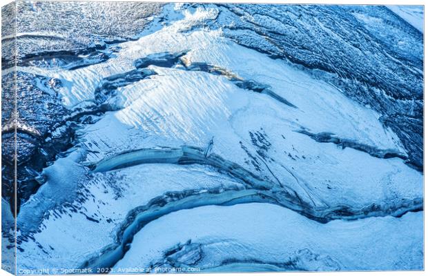 Aerial Icelandic volcanic frozen glacial river meltwater Europe Canvas Print by Spotmatik 