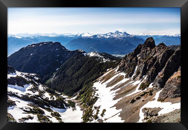 Aerial snow capped Wilderness Rocky mountains Vancouver Canada  Framed Print by Spotmatik 