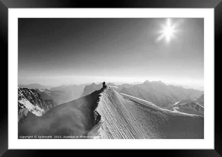 Aerial Switzerland mountaineers on snow covered Peak Europe Framed Mounted Print by Spotmatik 