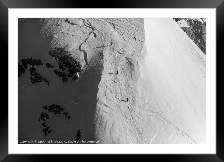 Aerial Switzerland mountain team climbing snow face Europe Framed Mounted Print by Spotmatik 