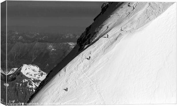 Aerial Switzerland mountain team climbing snow face Europe Canvas Print by Spotmatik 