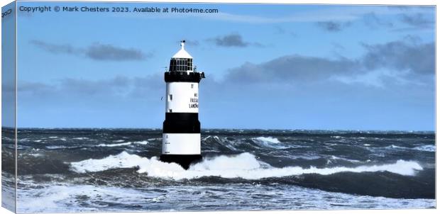 Guiding Light in the Turbulent Sea Canvas Print by Mark Chesters