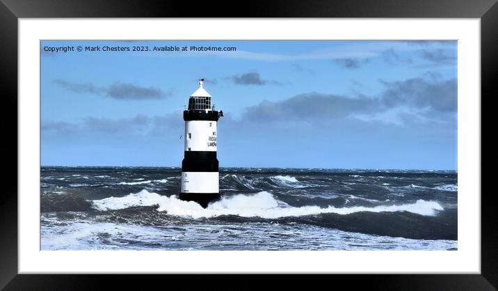 Guiding Light in the Turbulent Sea Framed Mounted Print by Mark Chesters