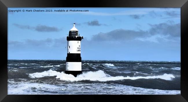 Guiding Light in the Turbulent Sea Framed Print by Mark Chesters
