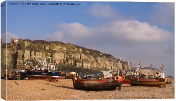 fishing boats on Hastings Beach Canvas Print by Sally Wallis
