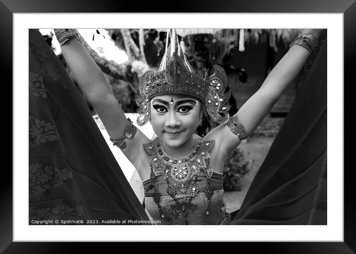 Balinese female dancer performing Ceremonial traditional dance Framed Mounted Print by Spotmatik 