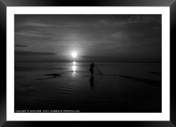 Silhouette Balinese sunrise fisherman casting net Flores sea Framed Mounted Print by Spotmatik 