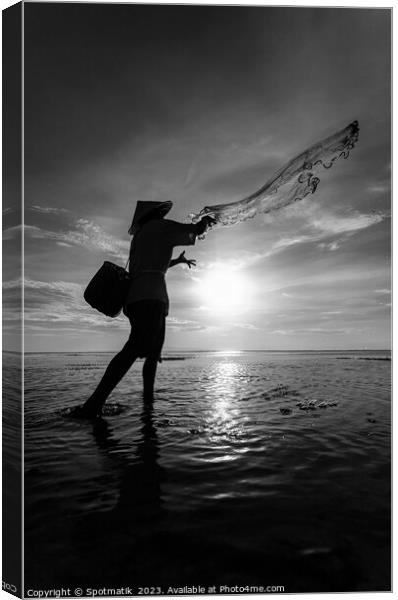Silhouette Balinese sunrise fisherman casting net Flores sea Canvas Print by Spotmatik 