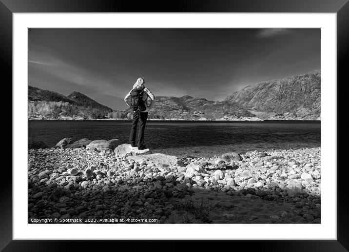 Norway female admiring scenic beauty of Norwegian fjord  Framed Mounted Print by Spotmatik 