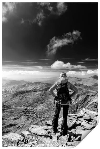 Young female hiker relaxing on mountain summit Wales Print by Spotmatik 