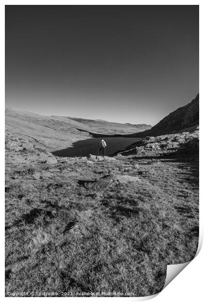 Lake in rural landscape with female backpacker Snowdonia Print by Spotmatik 