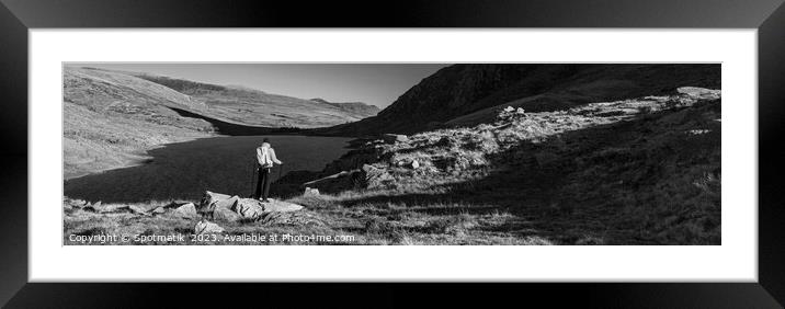 Panoramic lake among mountains with female hiker Snowdonia Framed Mounted Print by Spotmatik 