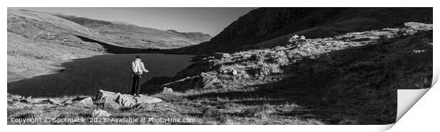 Panoramic lake among mountains with female hiker Snowdonia Print by Spotmatik 