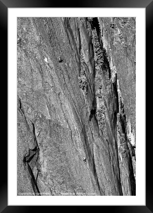 Aerial male rock climber cliff face Squamish Canada Framed Mounted Print by Spotmatik 