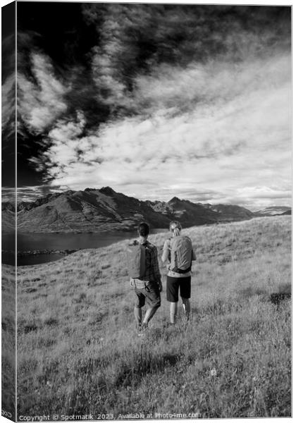 New Zealand trekking couple viewing Lake Wakatipu Otago Canvas Print by Spotmatik 