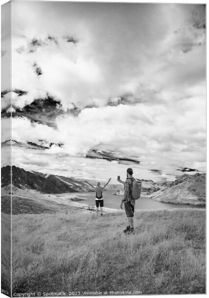Young male taking picture of female friend Queenstown Canvas Print by Spotmatik 