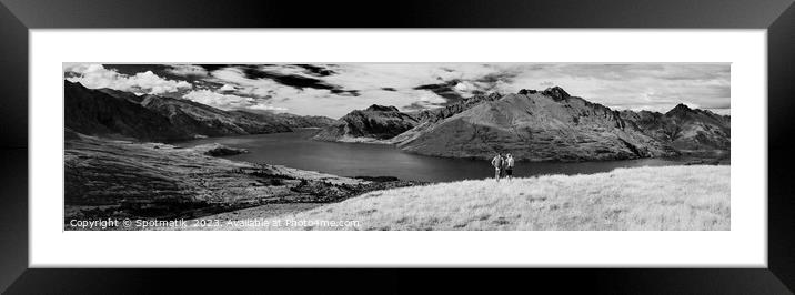 Panorama of New Zealand trekking couple viewing Lake Wakatipu Framed Mounted Print by Spotmatik 