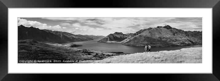 Panorama of backpacking couple spending vacation hiking outdoors Framed Mounted Print by Spotmatik 