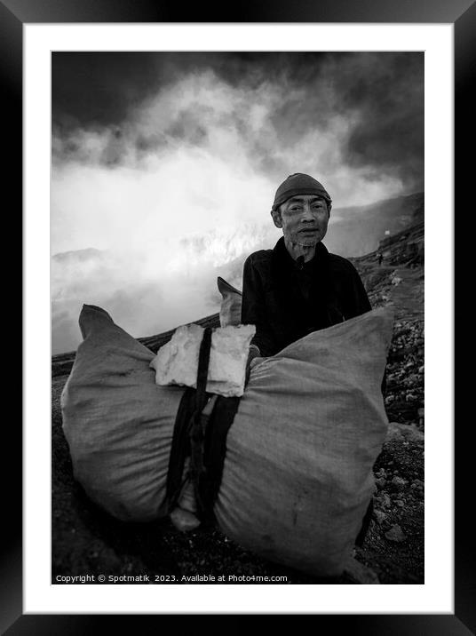 Ijen Java Indonesia sulphur mined by local male  Framed Mounted Print by Spotmatik 